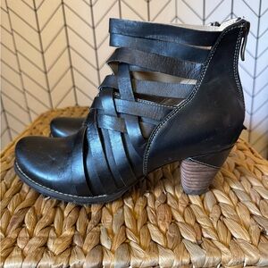 Elegant Black Strappy Heeled Boots